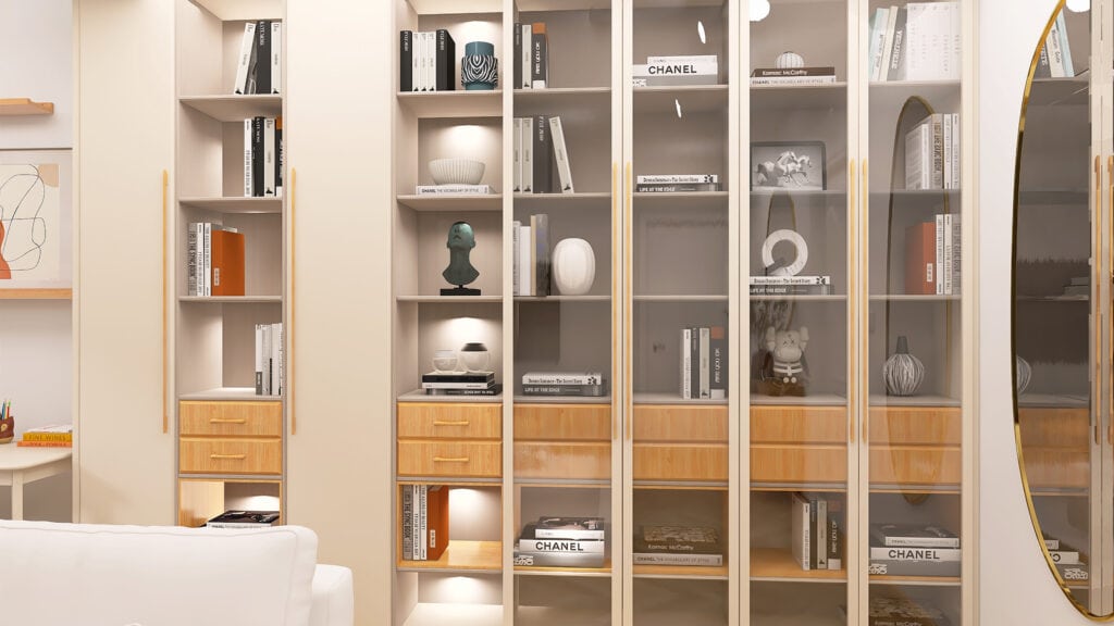 Przeszklona biblioteczka z książkami i dekoracjami, eleganckie wnętrze w stylu nowoczesnym z subtelnych odcieniami beżu.