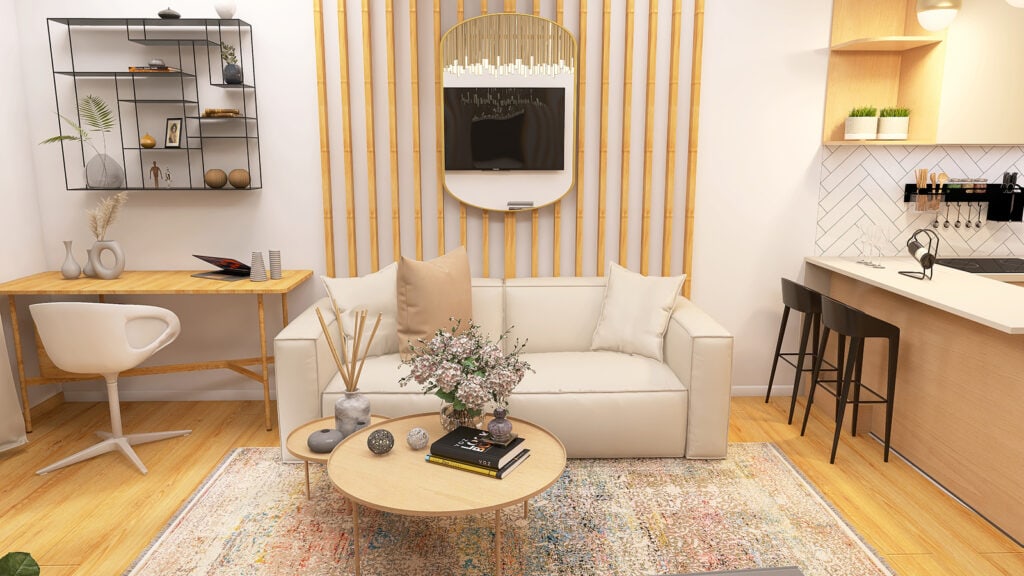 Przestronny salon z białą sofą, drewnianymi dodatkami i ozdobnymi elementami w ciepłych tonacjach.