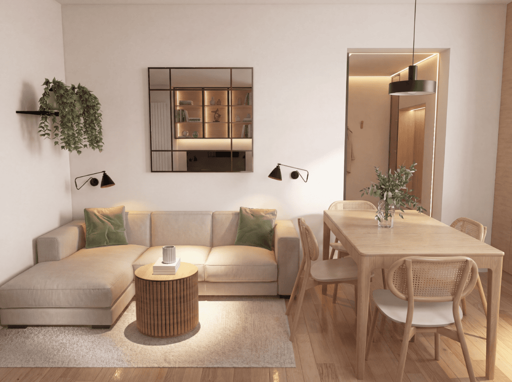 Jasny salon z narożnikiem, stolikiem i jadalnią w stylu skandynawskim.